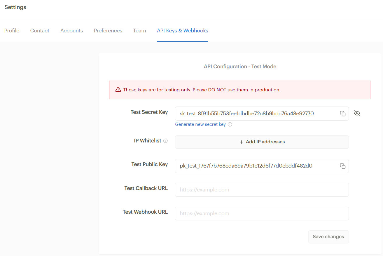 the api keys and webhooks page on Paystack showing the test and public keys