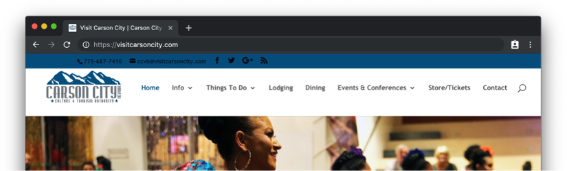 A screenshot of the Visit Carson City site header that has a horizontal row of links, with Events and Conferences being one of them. The navigation sits between a blue bar that has social media links and a large image that rotates with other images.
