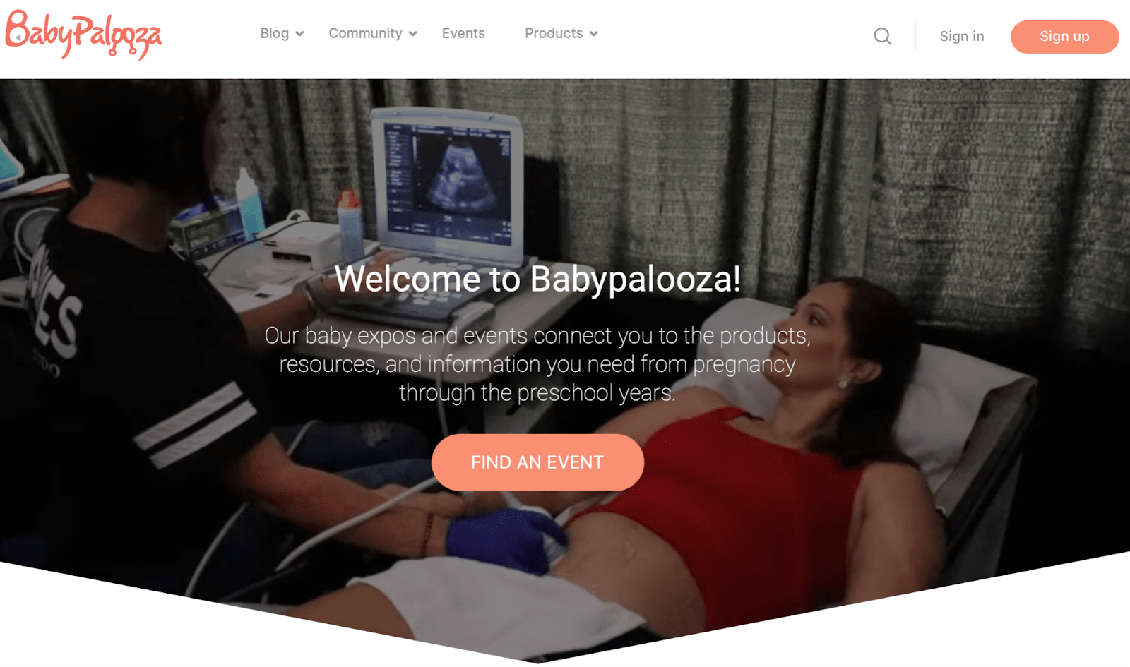 Babypalooza homepage. White header with orange logo and button to sign up. Hero area has an image of a nurse taking an ultrasound.