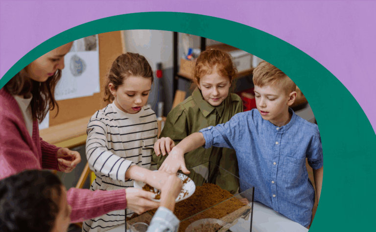 Children doing an activity together around a table