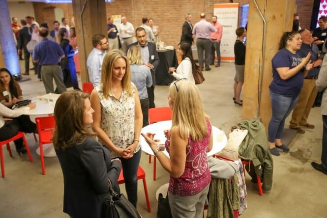 Group of people having discussions